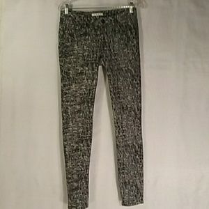 CAbi women's skinny jeans size 2 camo leggings
